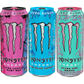 Three Monster Energy drink cans lined up side by side on a white background. The left can is Ruby Red in pink, the middle can is Blue Hawaii in bright blue, and the right can is Vice Guava in mint green with pink graphics.