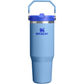 Blue Stanley tumbler with a handle on a white background